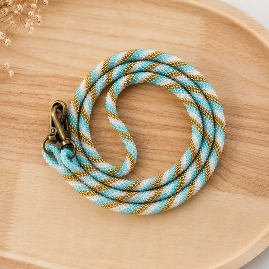 Cordon de téléphone bleu, blanc et doré Trésors de Ava Aqua